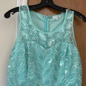 Mint green sequin leaf on top